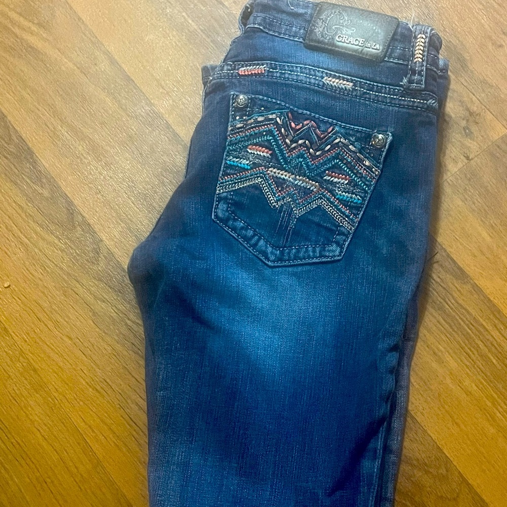 Grace in LA Jeans. Pre-Worn. Good Condition. Size 27